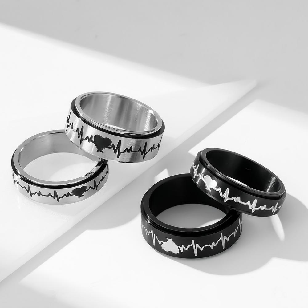 Rotatable Black And Silver Matching Heartbeat Couple Rings In Titanium